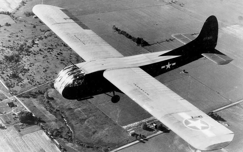 A Waco CG-4A glider under tow