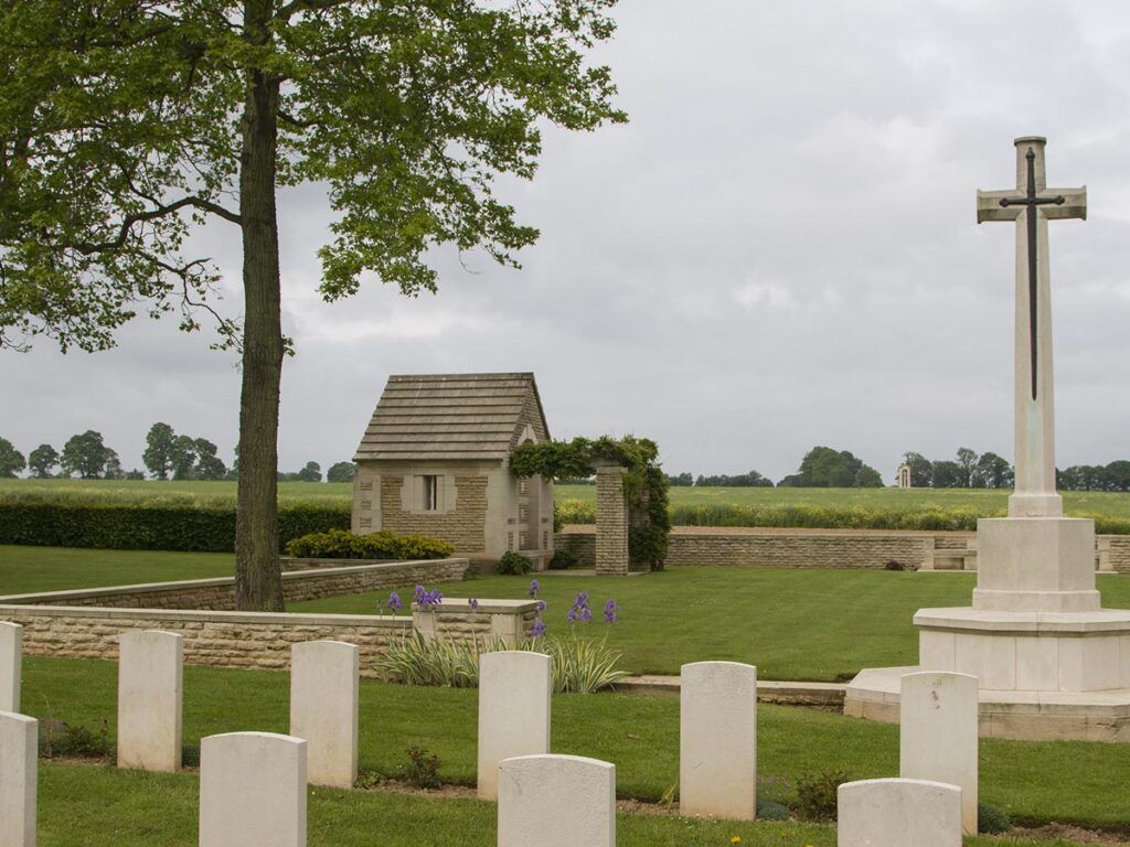 Headstones and Memorial at Fontenay-le-Pesnel War Cemetery