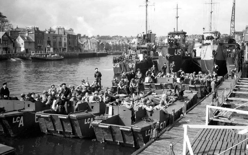 In Weymouth Harbor, LCA (Landing Craft Assault) and LCI (Landing Craft Infantry) await departure from Normandy