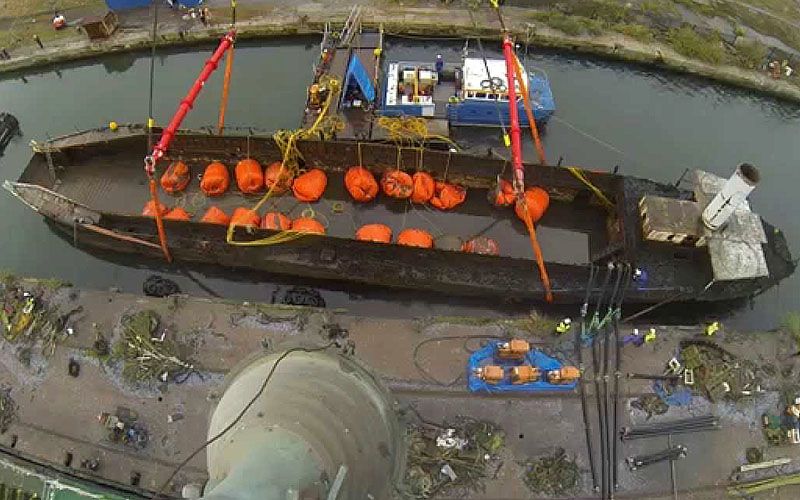 LCT7074 - The last surviving landing craft tank - being refloated prior to restoration